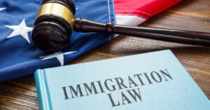 Immigration law book and gavel representing Moses Lake lawyers for immigrants