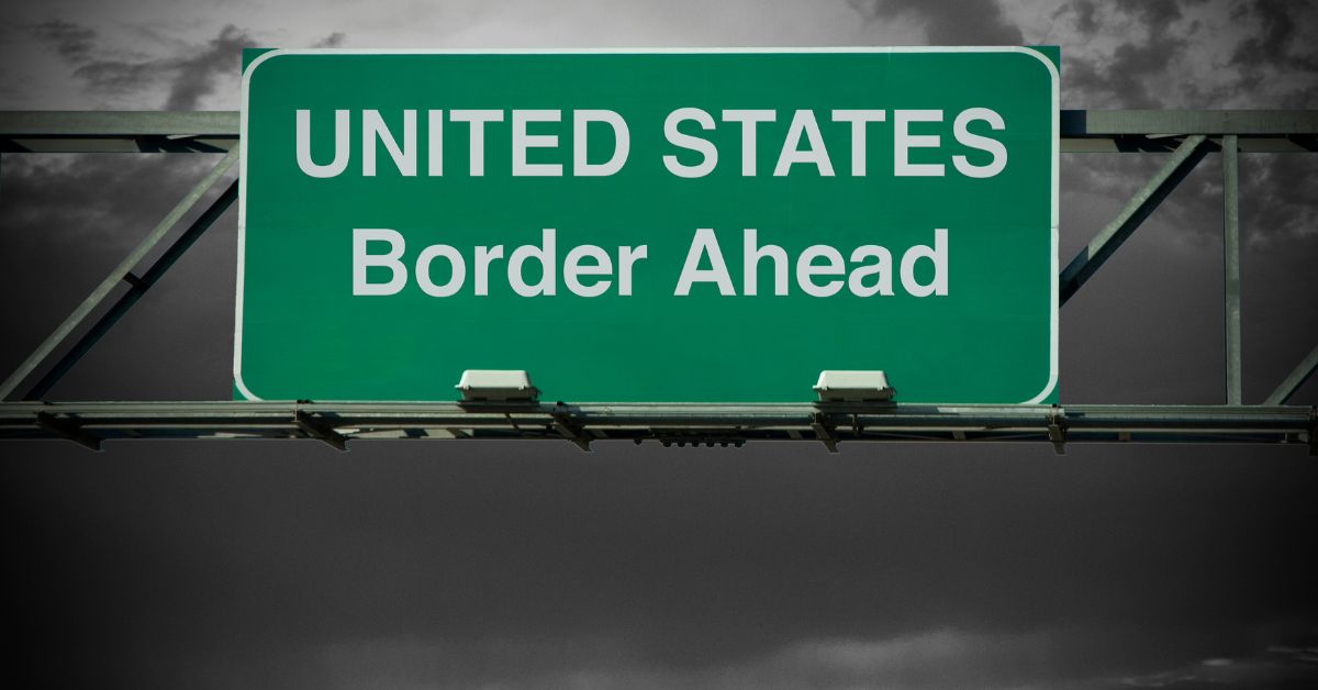 United States border ahead sign representing Moses Lake deportation defense legal services