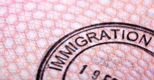 Immigration stamp on passport symbolizing family immigration law services in Wenatchee Washington