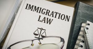 Immigration law book and legal documents representing immigration delay lawyers in Wenatchee Washington