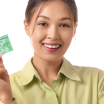 Smiling young woman holding an identification card
