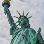 Statue of Liberty against a blue sky